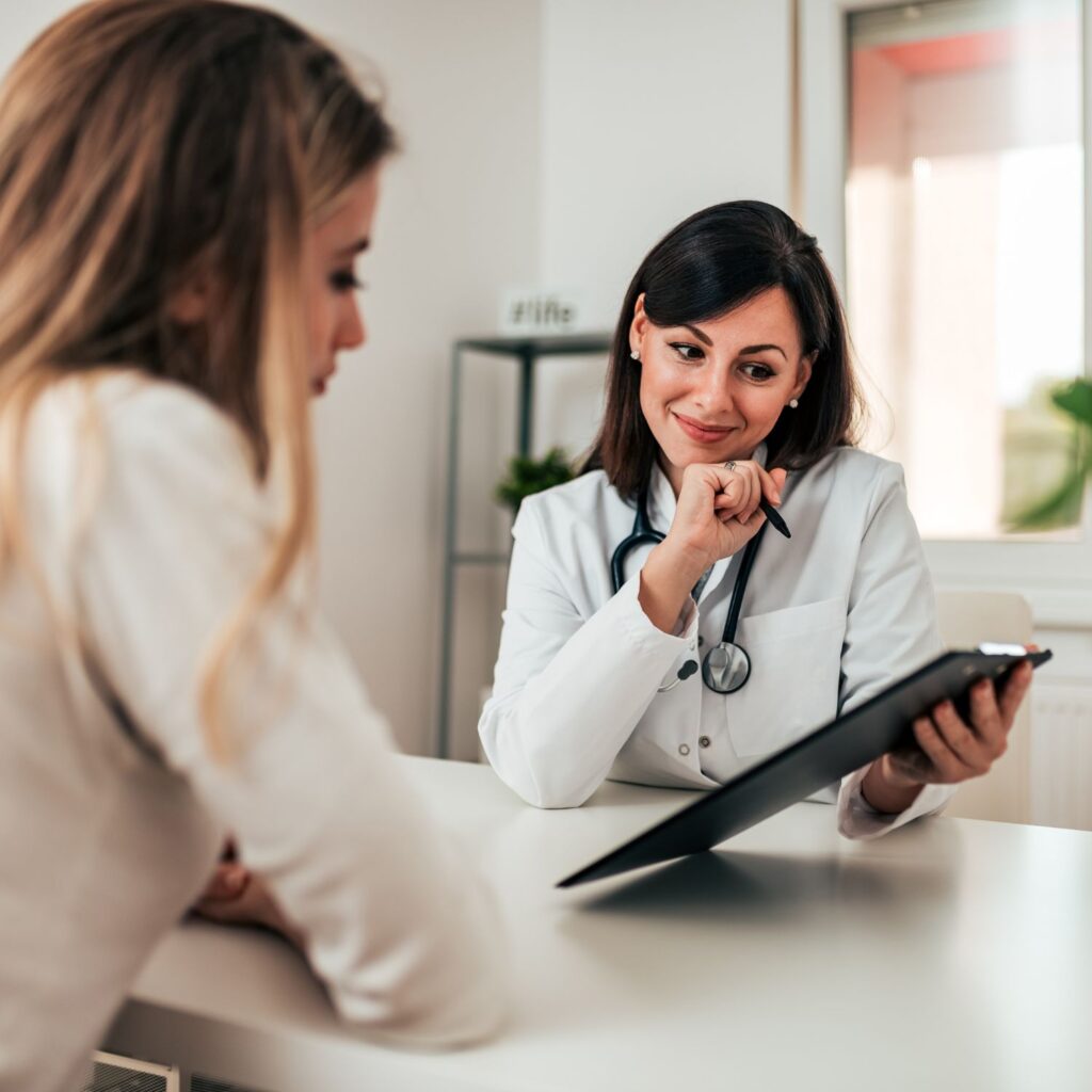 AV Chemist licensed personal injury pharmacy interior showing professional pharmacist consulting with injured patient about workers compensation medication delivery services in New York and New Jersey